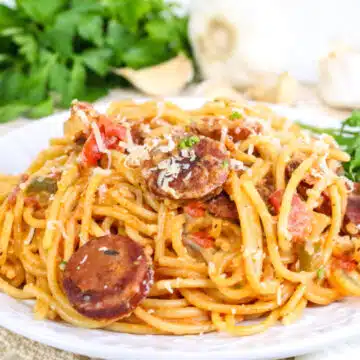 serving of Cajun sausage spaghetti with fresh parsley