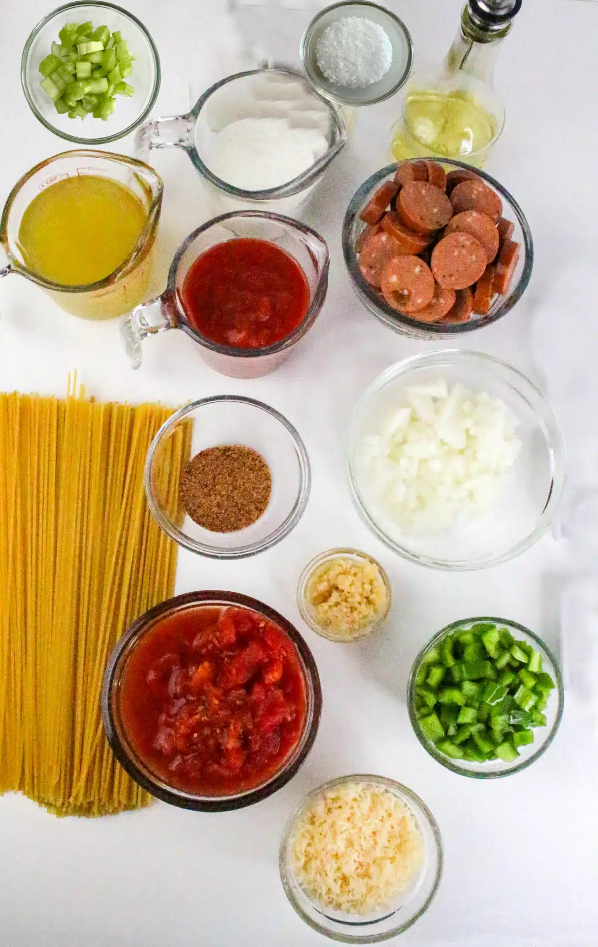 Ingredients for a creamy Cajun sausage pasta recipe