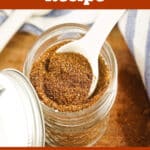 chili spice mix in a jar with spoon and text overlay