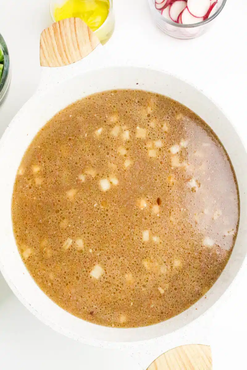 return the pork to the pot and add broth