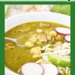 Mexican soup with pork and hominy in a bowl with toppings and text overlay