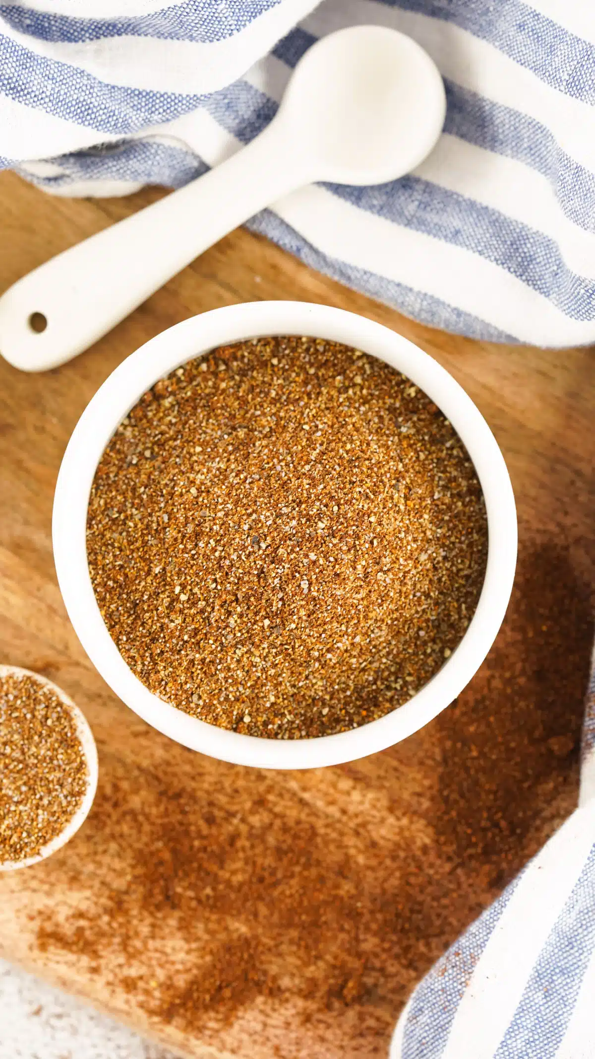 DIY chili seasoning in a bowl on a wooden board