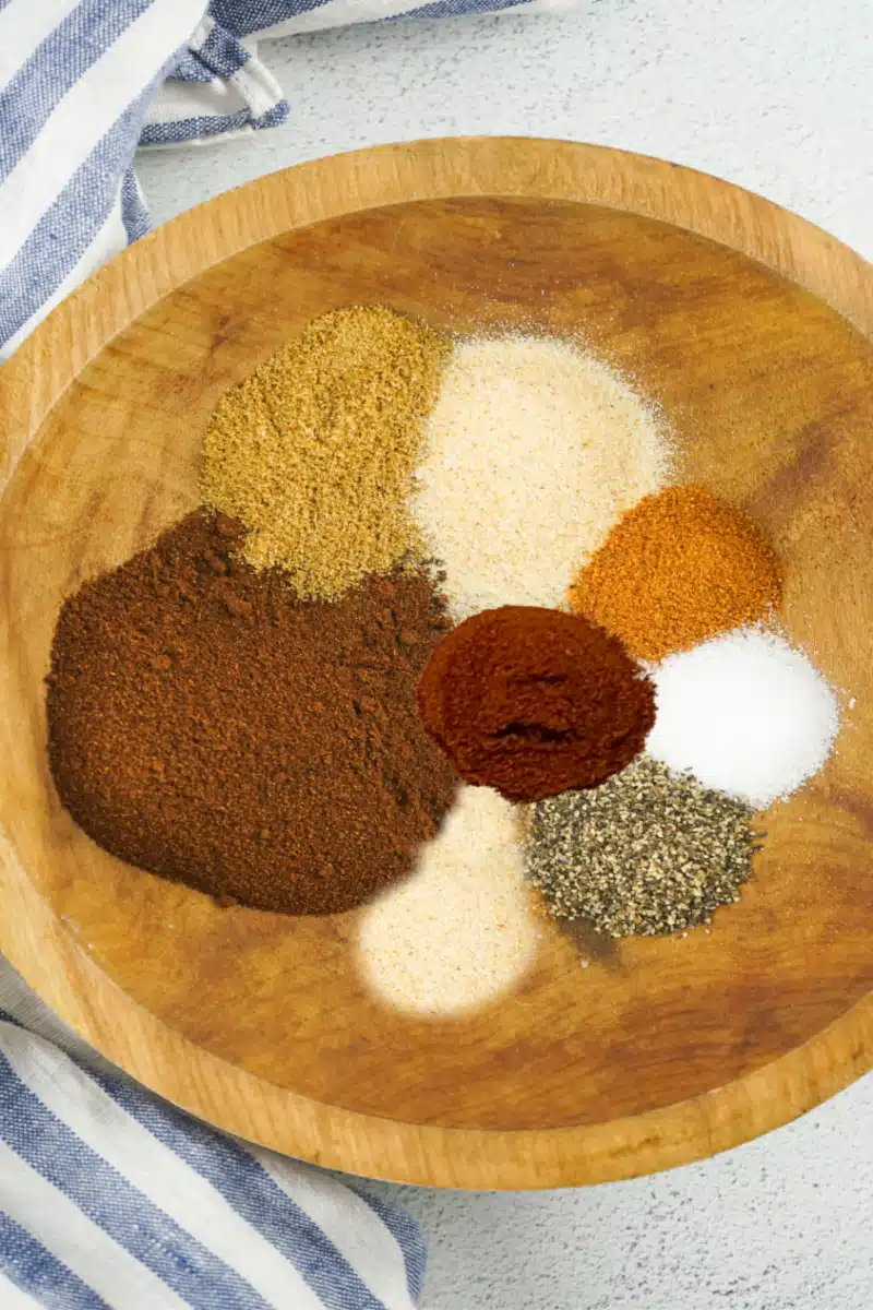 combining ingredients in a wooden bowl