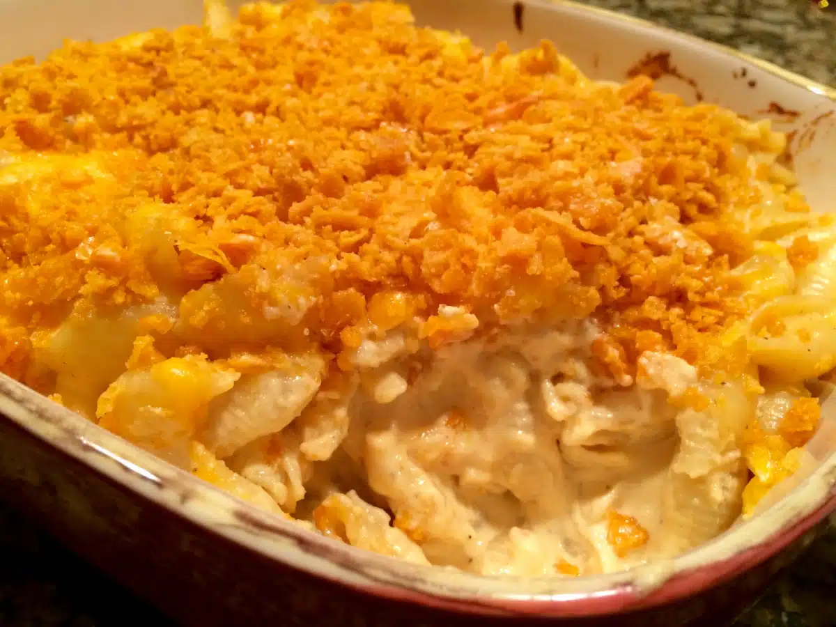 macaroni and cheese inbaking dish with scoop out