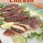 sliced blackened chicken on a platter with text overlay
