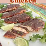 sliced blackened chicken on a platter with text overlay