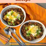 two bowls of easy chili recipe with toppings with spoons on an orange napkin and with text overlay