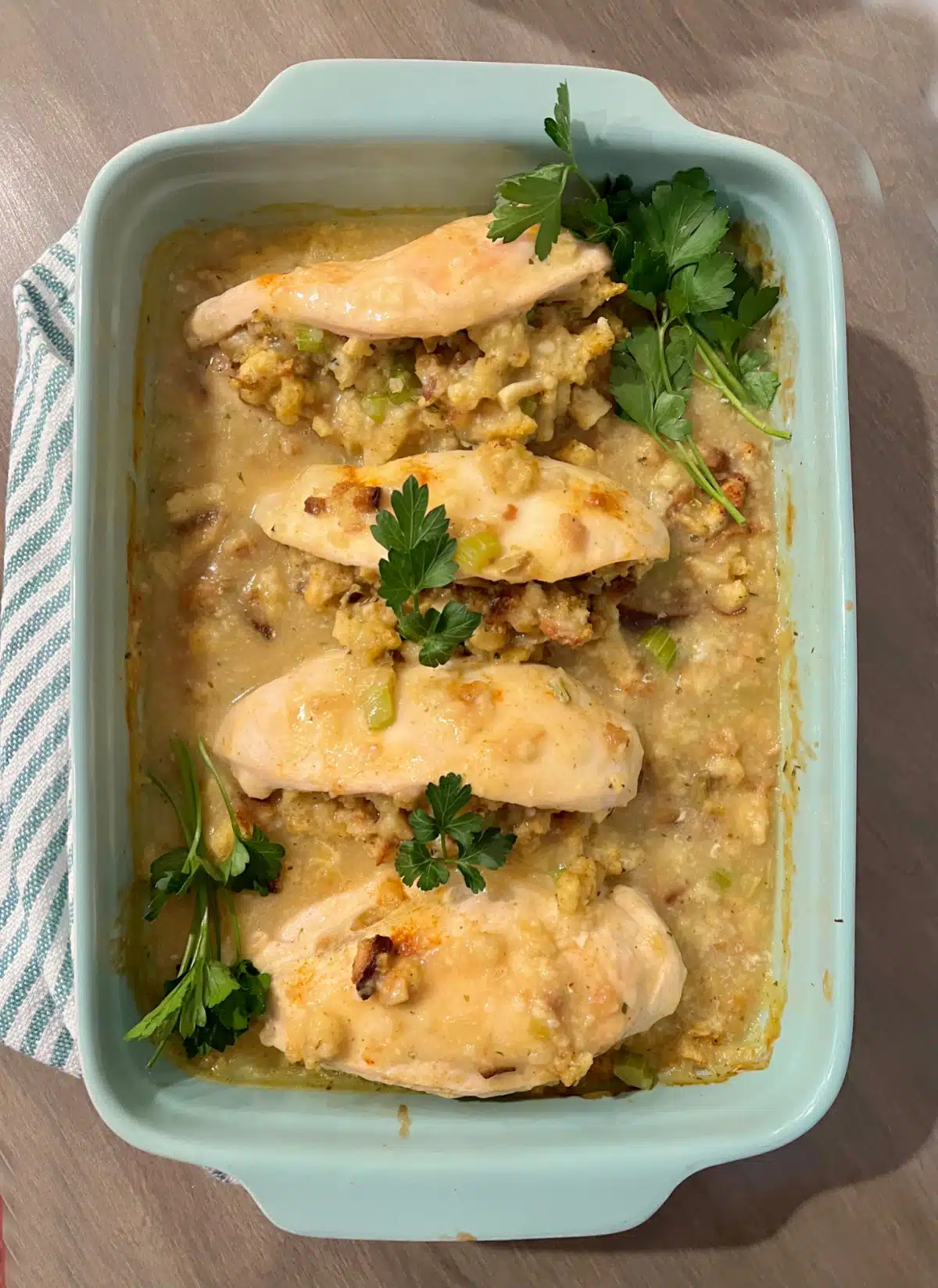 overhead of chicken breast with stuffing casserole