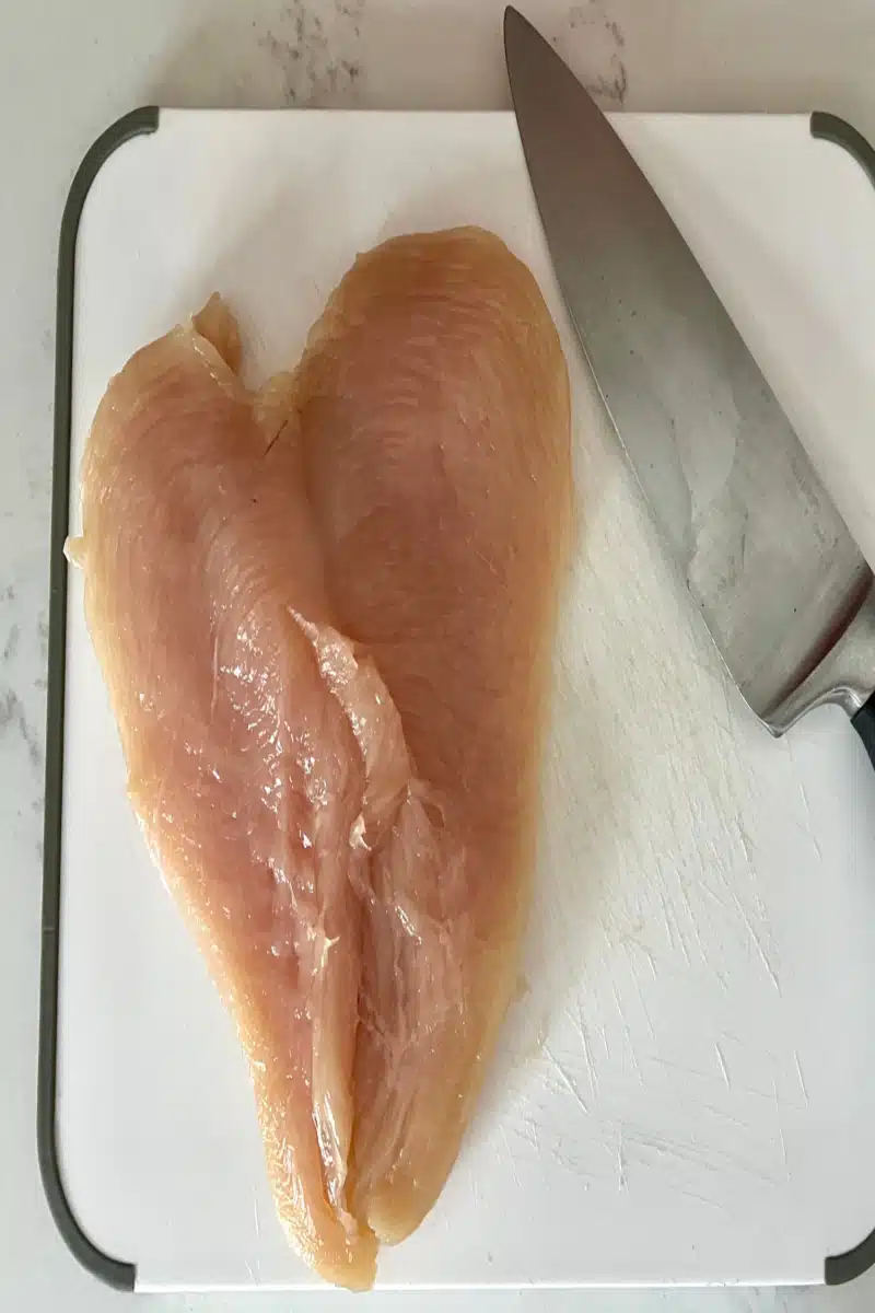 slicing chicken breasts in half but not all the way through