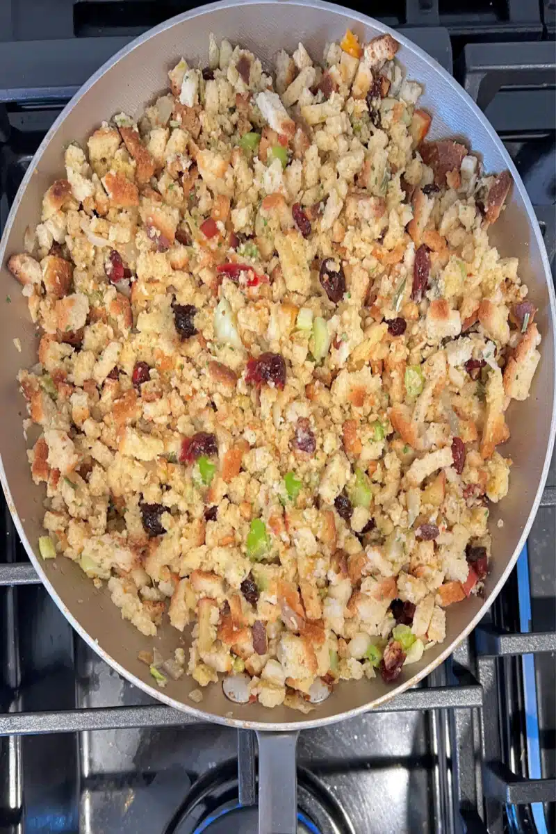 adding stuffing to the skillet