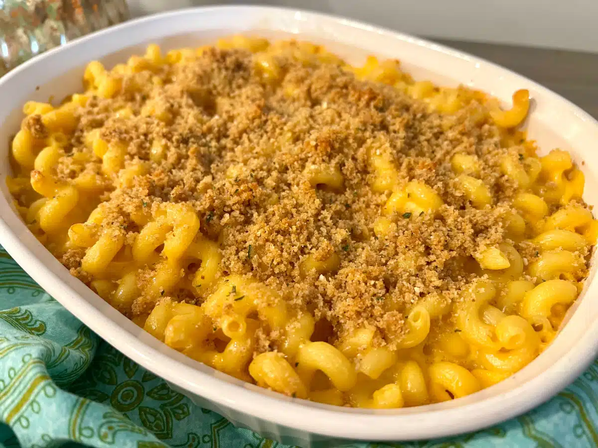 Velveeta mac and cheese in a baking dish with breadcrumb topping