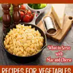 macaroni and cheese in a cast iron skillet with a cheese grater and salt and pepper shakers with text overlay