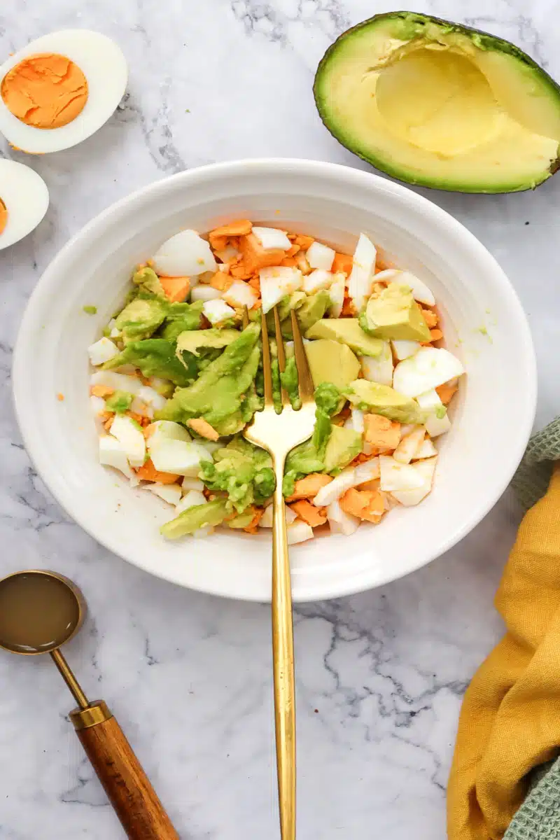chopped egg and chopped avocado in a bowl