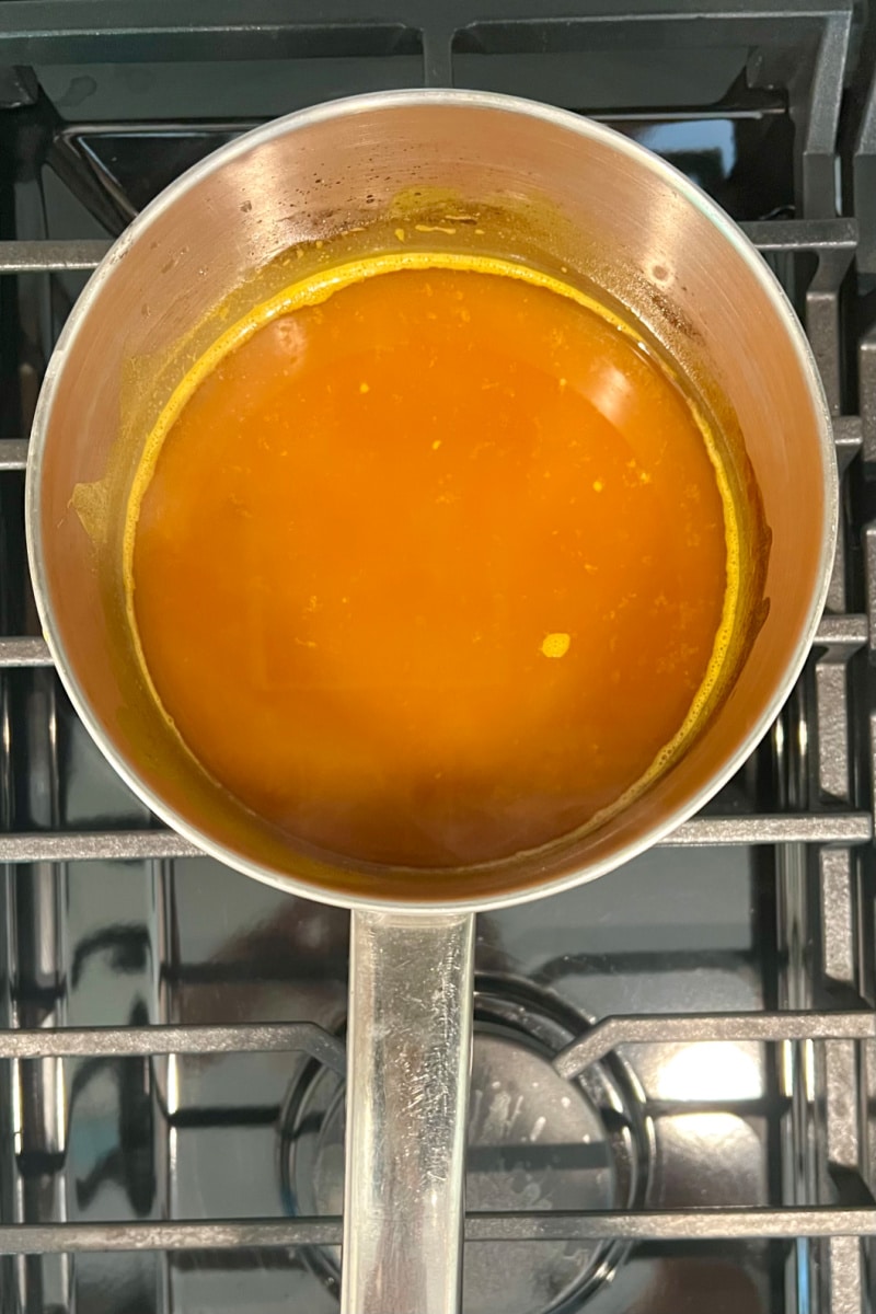 heating brining mixture in a saucepot