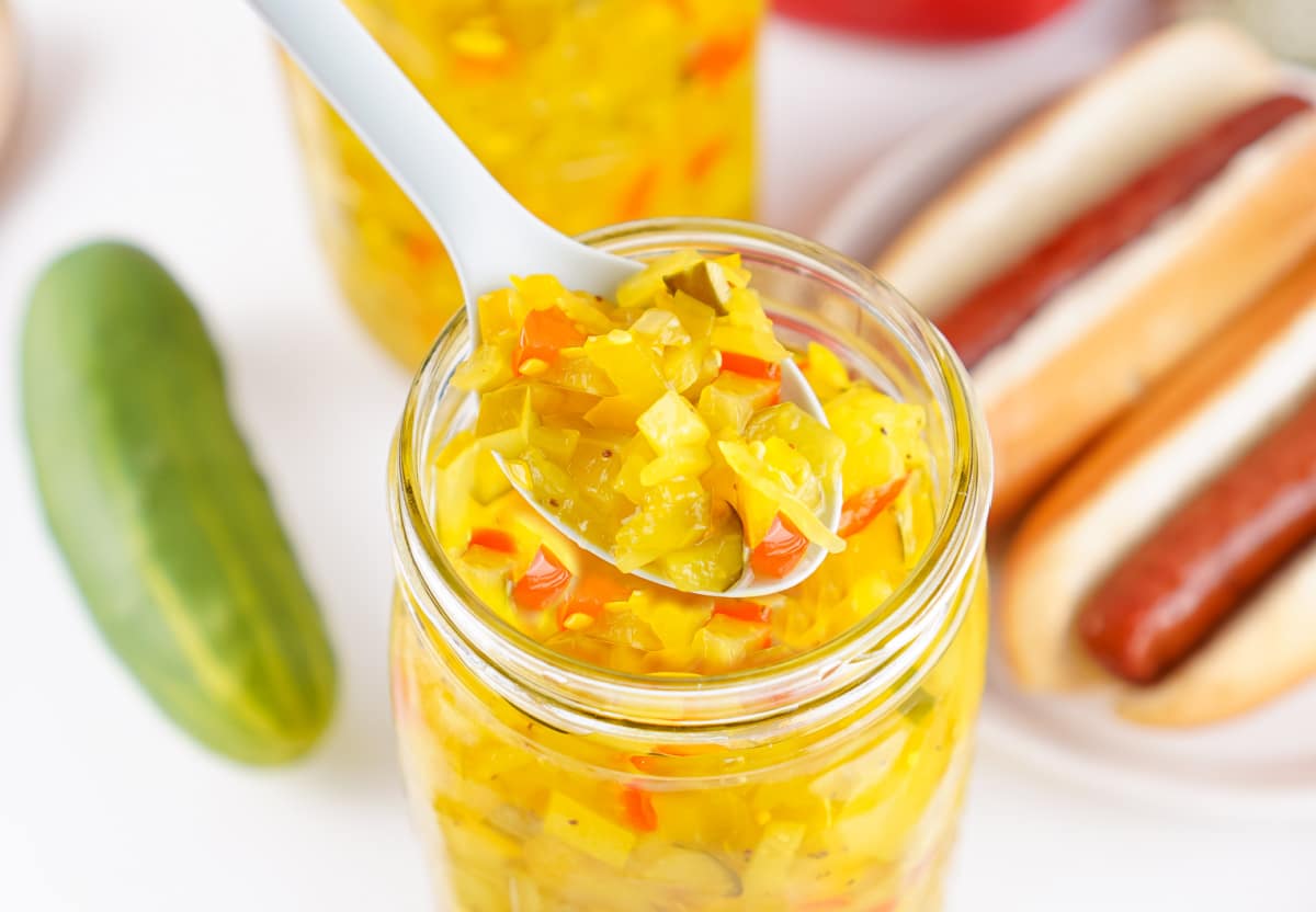 a spoonful of relish with mason jar