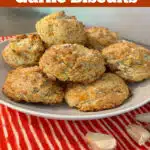 Bisquick biscuits with garlic and cheese on a bowl with text overlay