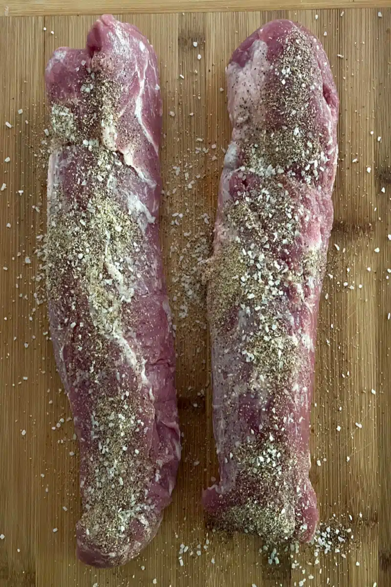 two pork tenderloins with seasonings