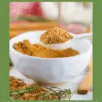 poonful of gingerbread spice mix with text overlay