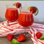 strawberry daiquiris in glasses with text overlay