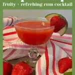 single glass of strawberry daiquiri recipe with fresh strawberries and lime and text overlay