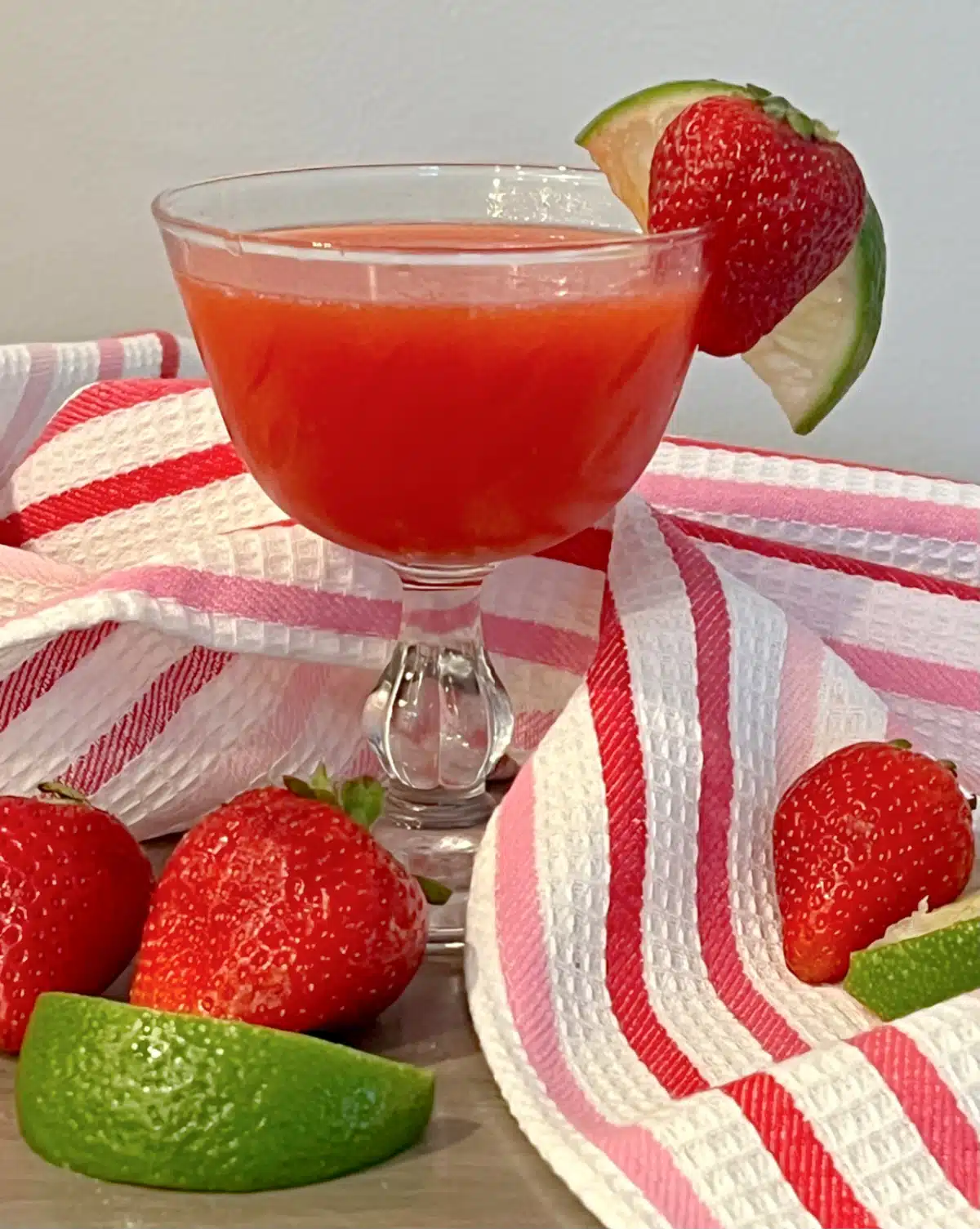 strawberry daiquiri cocktail in a coupe glass