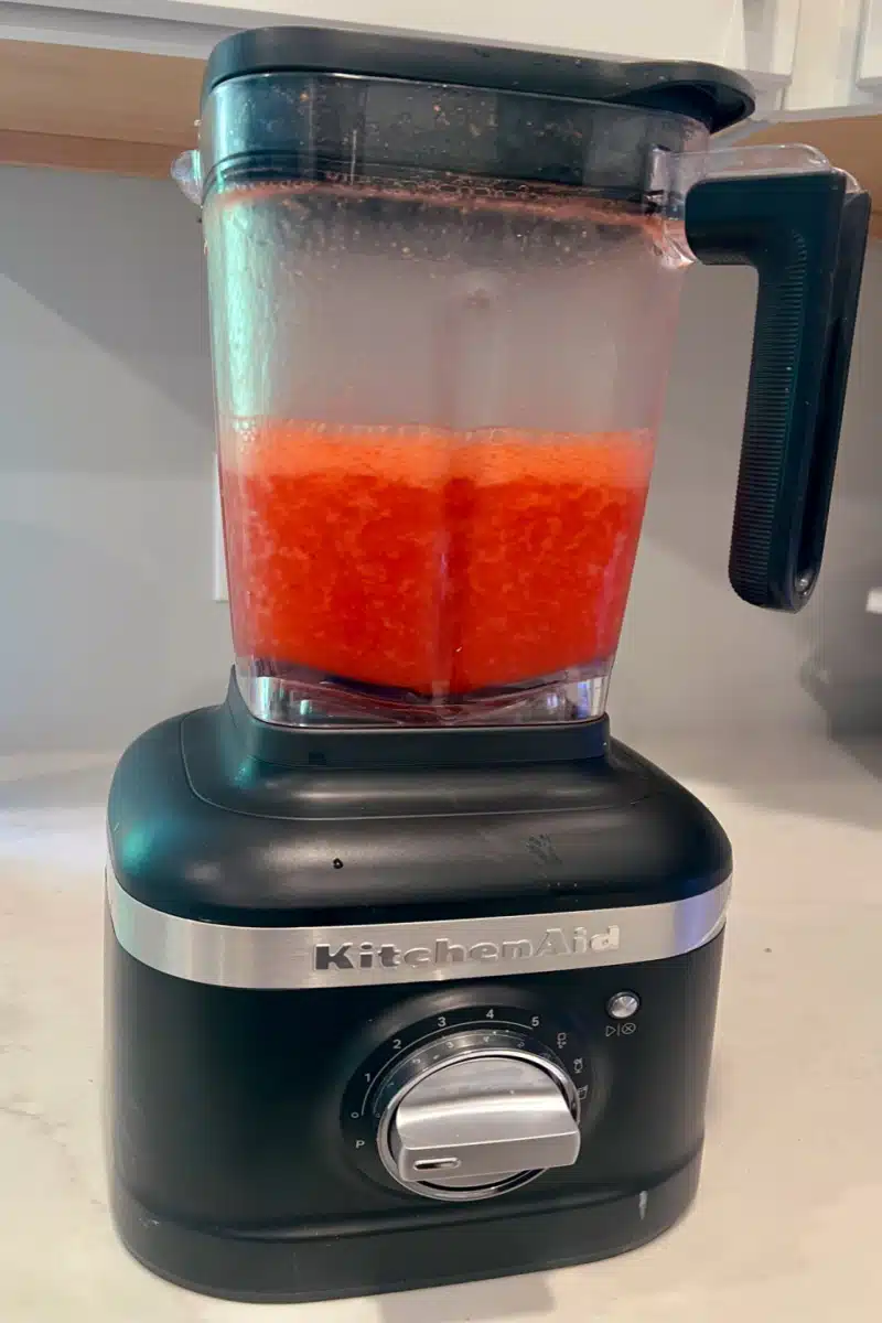 frozen strawberry daiquiri mixture in the blender