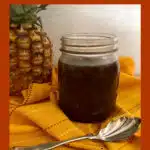 homemade sweet and sour sauce in a jar with text overlay