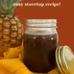 Sweet and sour sauce with freh pineapple and pretty napkin and text overlay