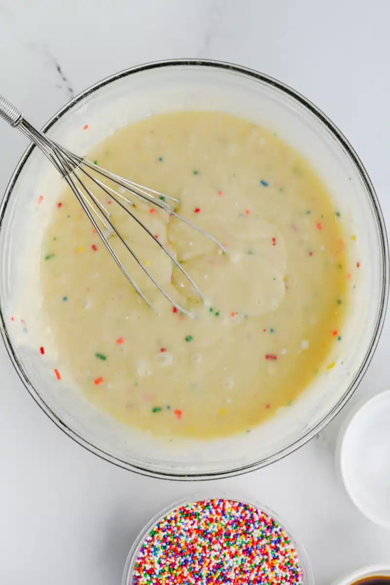 making cake batter in a bowl