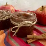 apple butter in mason jars with pretty napin and rsh apples