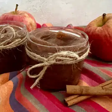 apple butter in mason jars with pretty napin and rsh apples