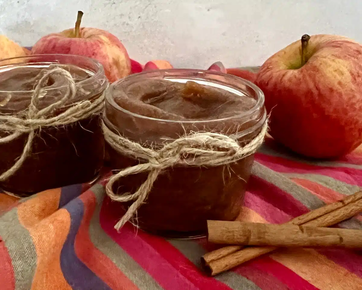 apple butter in mason jars with pretty napin and rsh apples