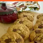 pumpkin cookies with a glass pumpkin and text overlay