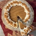 overhead photo of Biscoff cheesecake with slice cut out